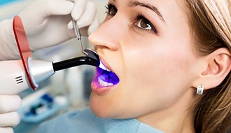 A woman getting a dental bonding procedure