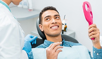 Dental patient having a consultation about dental bonding
