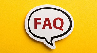 Word bubble with FAQ on yellow background