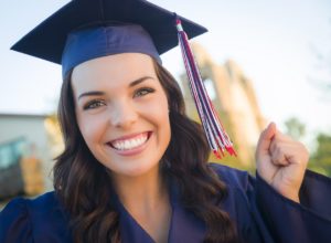 college graduate smiling